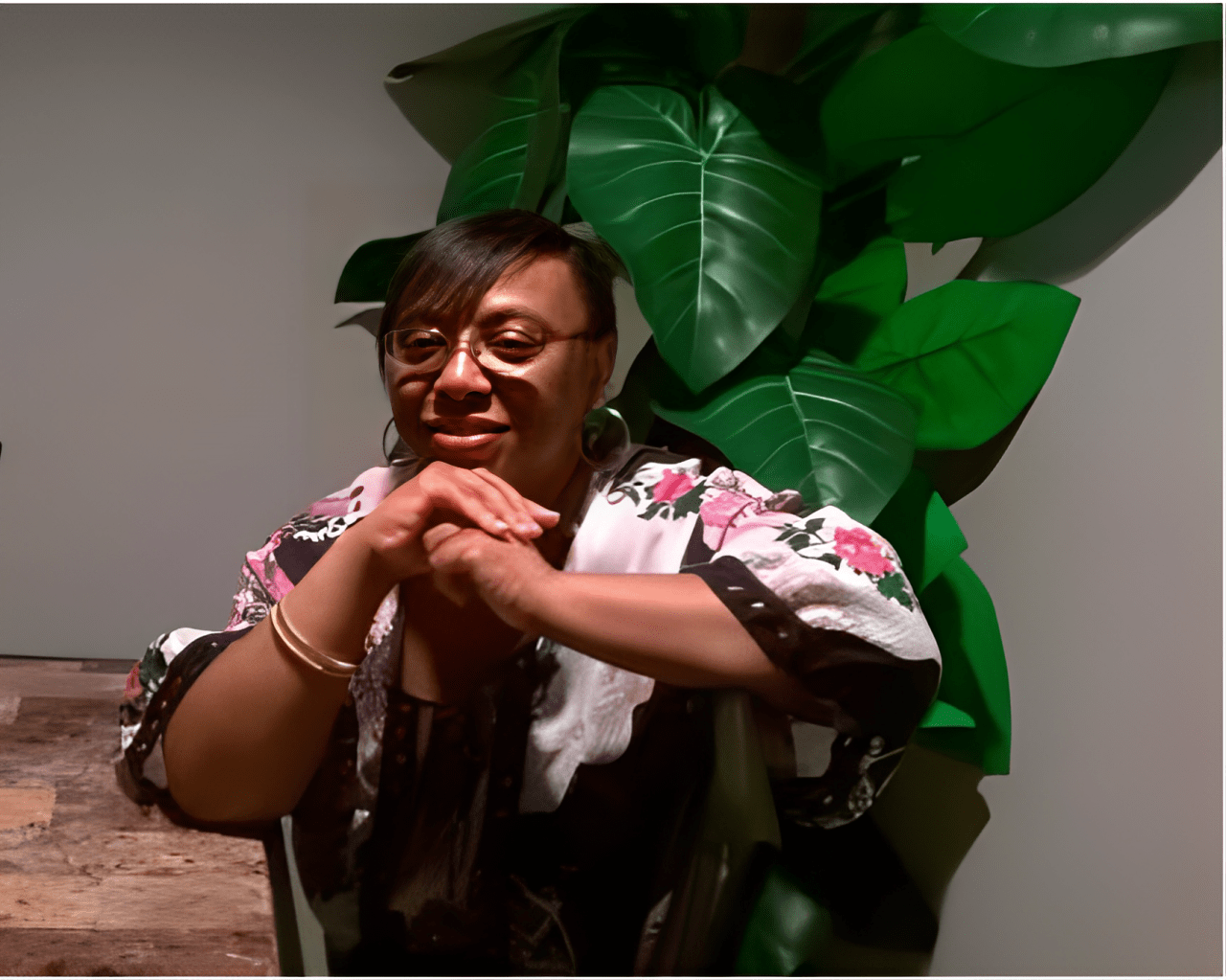 Pamela Jones sitting on a chair